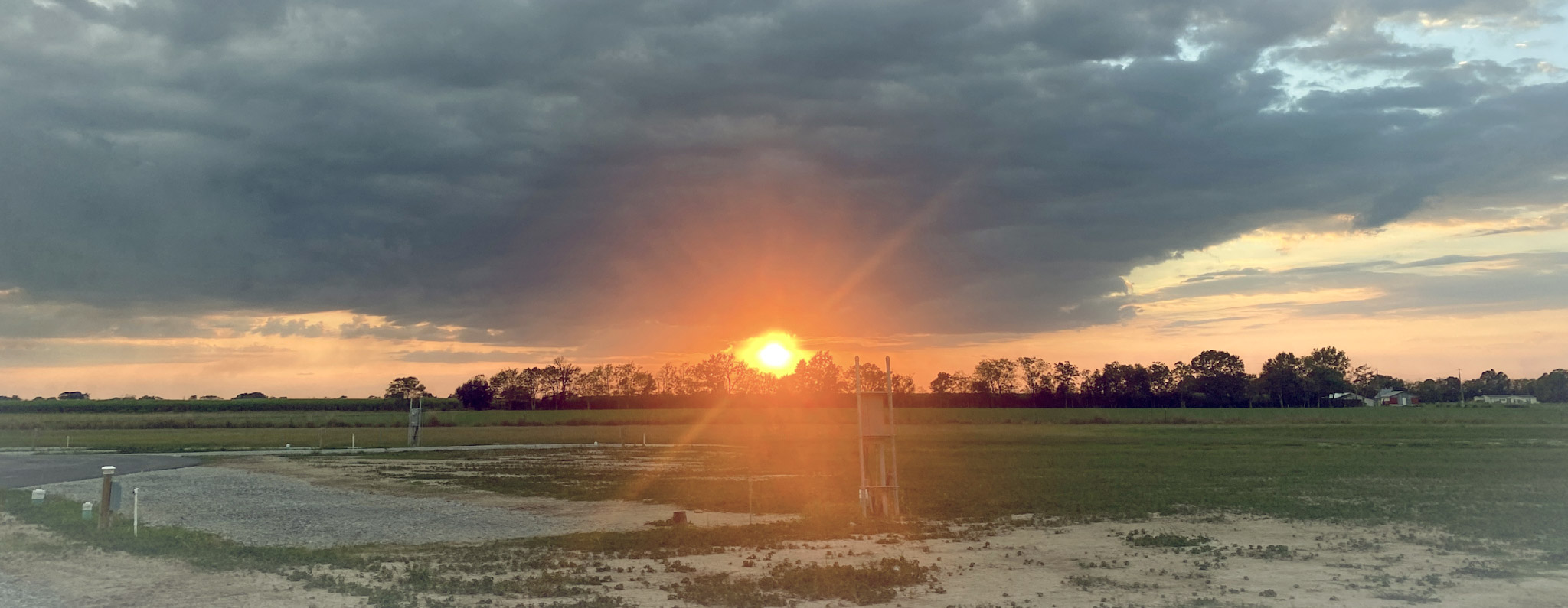 a beautiful sunset in a wide open space